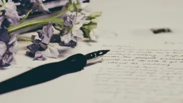 A pen on a paper to write a thank you letter to father-in-law